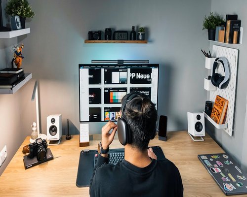 Ergonomic desk setup with a person sitting straight